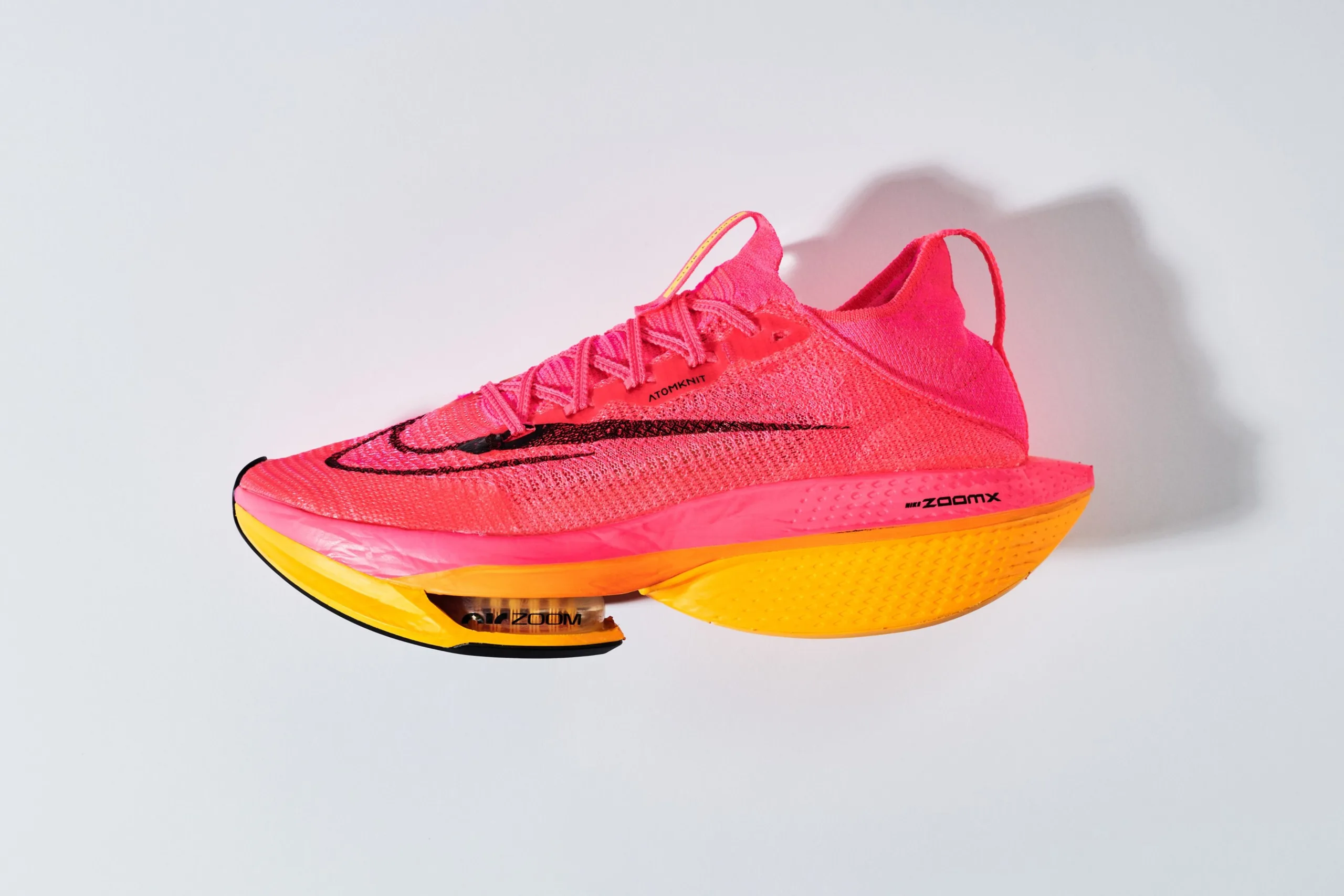 Nike Air Zoom Alphafly NEXT% 2 สีชมพูส้ม กับชุด Air Zoom หน้าเท้า